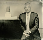 Robert Zimmer, President of the University of Chicago and professor of mathematics, with a clay cylinder from Mesopotamia, ca. 2000-1600 BC, inscribed with a table of reciprocals and thirty-seven separate multiplication tables. It is the oldest known collection of mathematical formulas known on a clay cylinder. OIM A7897.