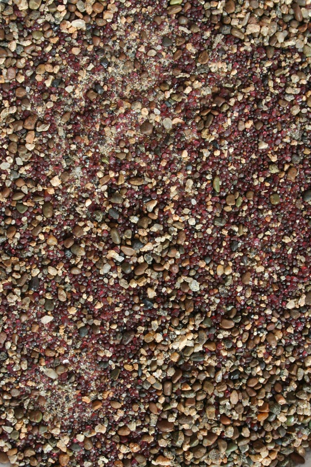 Sand rich in garnets ('fayrous') found in a seasonal stream bed of the Nile, said by local people to be a sign that deposits contain gold (photo #6520).